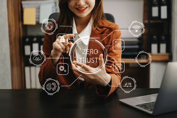Zero trust security concept Person using computer and tablet with zero trust icon on virtual screen...