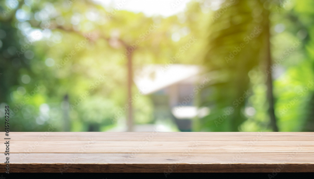 Poster top of wood table counter on blur window view garden background. for montage product display or desi