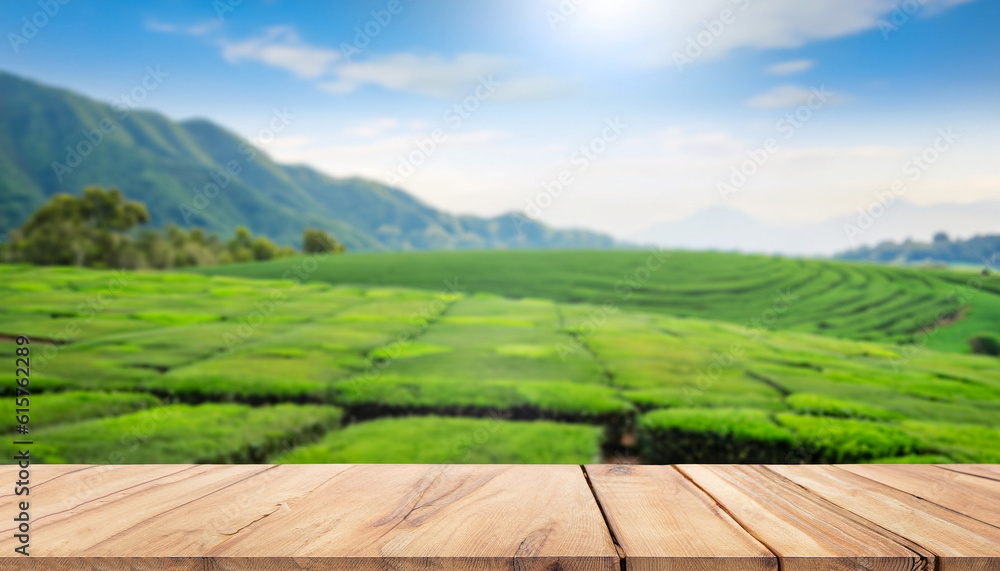 Poster wooden table top on blur green tea mountain and grass field. fresh and relax concept. for montage pr