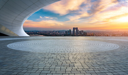 Round floor and city skyline with modern building at sunset in Suzhou, Jiangsu Province, China....