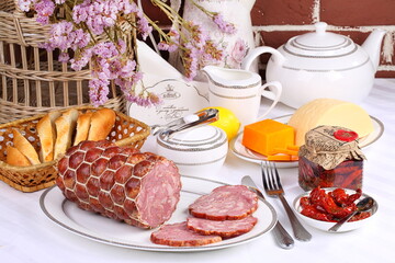 Pork ham with tea  on wooden background