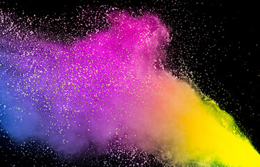 Colored powder explosion on a dark background