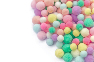Pastel balls or pom pom balls made of fabric