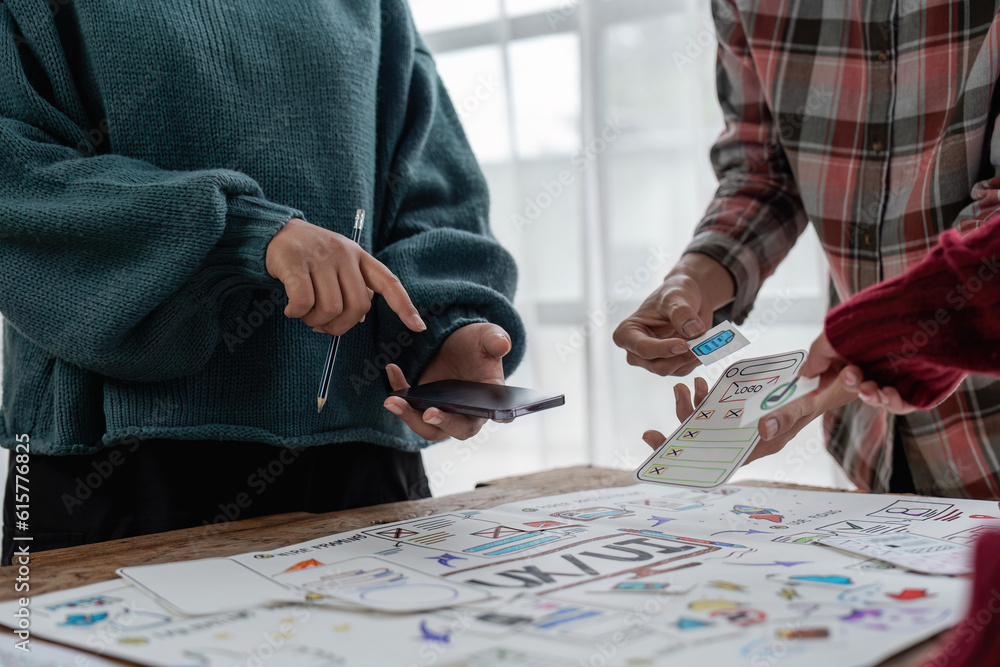 Aufkleber the web designer team is helping to design applications for mobile phones. ux ui designer concept