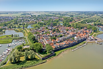 Fototapeta na wymiar Aerial from the historical city Woudrichem at the river Merwede in the Netherlands