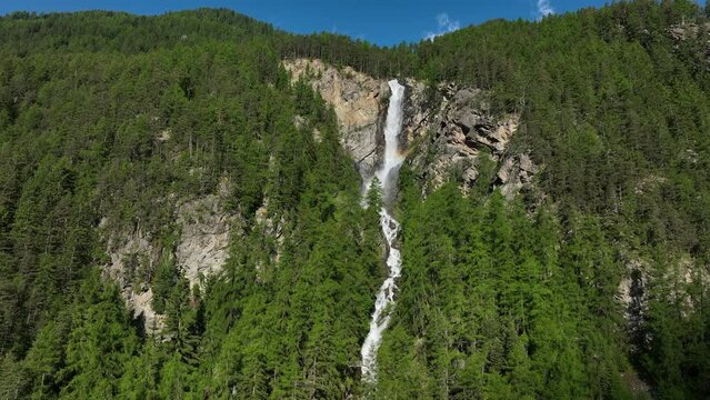 Lehner Wasserfall waterfall in the �tztal valley in Tyrol Austria during a beautiful springtime day in the Alps.