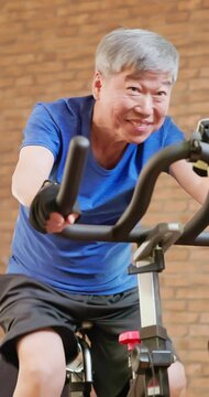 Asian elderly sports in gym