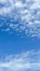 Blue cloudy sky texture. Natural sky composition