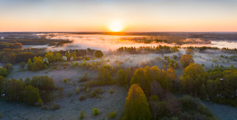 Aerial view of a foggy sunrise