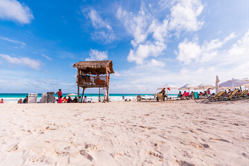 Cancun Mexico beautiful caribbean sea on a sunny day and cloudy sky. Exotic Paradise. Travel, Tourism and Vacations Concept. Tropical Resort.