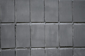 gray-colored tiled background is a visually appealing element that adds a subtle and neutral tone...