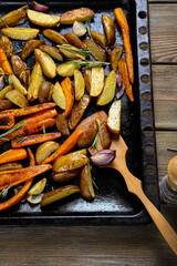 Delicious vegetables wedges on a baking sheet