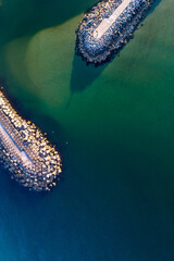 zenithal drone view of a harbor jetty