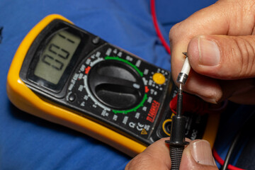 digital multimeter, ammeter instrument close-up.