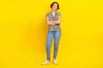 Full length photo of business lady hold folded arms toothy smiling wear print blouse jeans shoes...