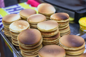 A lot of cooked pancakes without filling in vietnamese night market