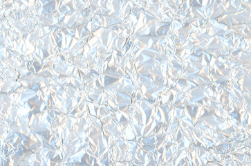 Crumpled shiny aluminum foil background.
