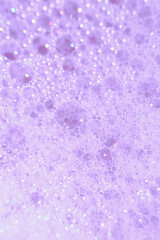 thick purple soap foam, close-up photo of objects