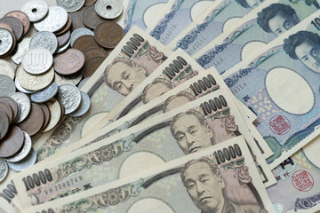 Japanese Yen money. close up of the Japanese yen on hand. currency of Japan that is used to change,...