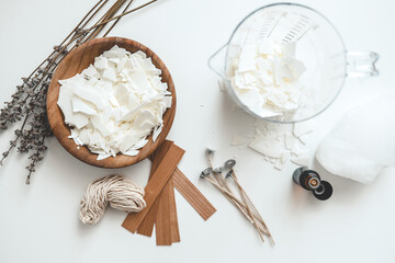 Set for crafting candle on white background. Eco soy wax and candle making tools. DIY candles....