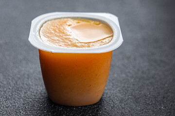 fruit puree no sugar apple, pear fruit healthy meal food snack on the table copy space food background rustic top view keto or paleo diet veggie vegan or vegetarian food