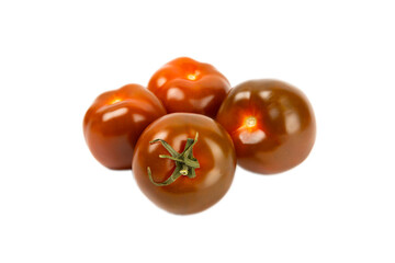 Black tomato isolated on white background. Fresh black tomatoes. Fresh vegetables. Vegan. Close-up. Healthy food. Salad Ingredients.