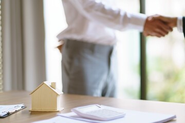 Approved stamp with Business people signing contract making deal with real estate consultant home...