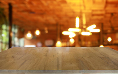 Empty wood table top and blur of out door garden background Empty wooden table space for text marketing promotion. blank wood table copy space for background