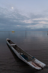 Rustic canoe at the sunset at Morer&eacute;, Bahia, Brazil