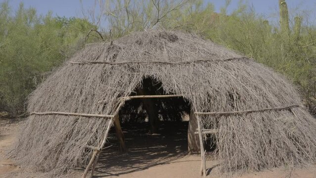 This video shows a front view of an ancient Native American manmade hut.