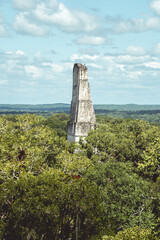 The ancient Mayan Tikal ruins raising out of the Jungle in northern Guatemala.