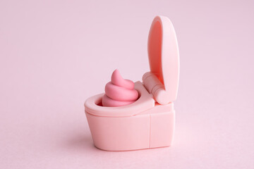 ピンクのウンチとトイレの便器
