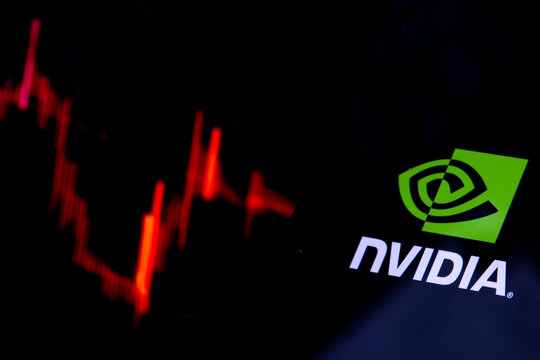 Nvidia investment lost trading concept. Nvidia company logo on screen of smartphone against blurred background of down trading stock chart. USA, June 22, 2023