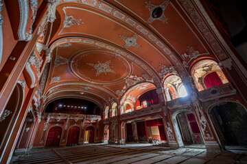 Obraz premium Exploring, Abandoned, Historic, Red, Cinema, Theatre, Miskolc, Hungary, Journey, Time, Culture, Forgotten, Architectural Gem, Heritage Site, Theatrical Splendor, Haunting Beauty, Time Capsule, Cultura