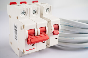 Automatic circuit breaker on white background, control and protect electrical power system.