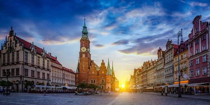 Wroclaw central market square with old houses and sunset. Panoramic evening view, long exposure, timelapse.  Historical capital of Silesia, Wroclaw (Breslau) , Poland, Europe.