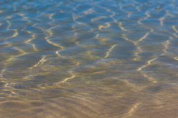 Fototapeta na wymiar ripples on clear clear water