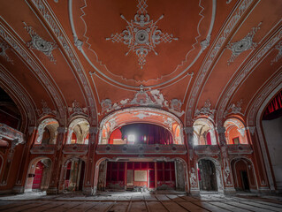 Obraz premium Exploring the Historic Abandoned Red Cinema and Abandoned Red Theatre in Miskolc, HungaryJourney Through Time and Culture