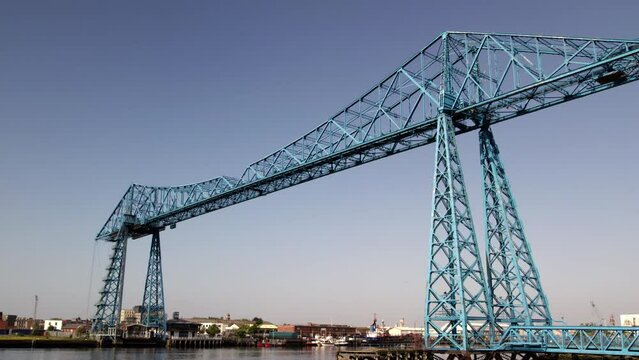 Drone tracks around the Transporter Bridge in Middlesbrough at low level on a beautiful spring morning 