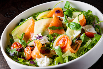 smoked salmon salad with cucumbers, cream cheese, arugula