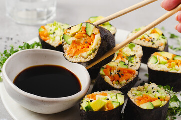 Vegan Sushi Rolls with Fresh Vegetables and Quinoa, Tasty Vegetarian Meal