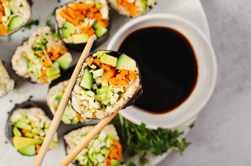 Vegan Sushi Rolls with Fresh Vegetables and Quinoa, Tasty Vegetarian Meal
