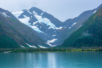 Fototapeta na wymiar Byron Glacier is located in Girdwood, Alaska on the Kenia Peninsula, sitting adjacent to Portage Lake and Portage Glacier.