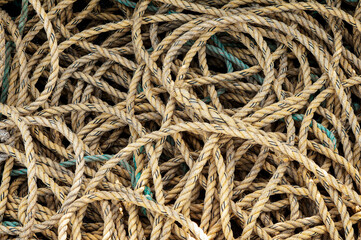 Coils of old weathered rope background