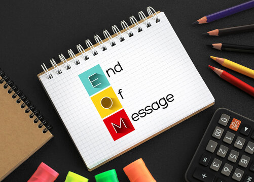 EOM - End Of Message acronym on notepad, business concept background
