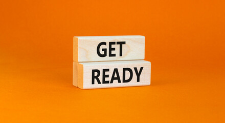 Get ready symbol. Concept words Get ready on wooden blocks on a beautiful orange table orange...