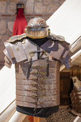 ancient roman empire soldier clothing, armor and imperial helmet, lorica segmentata and imperial...