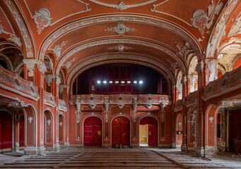 Obraz premium Exploring the Historic Abandoned Red Cinema and Abandoned Red Theatre in Miskolc, HungaryJourney Through Time and Culture