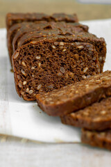 Black rye bread with seeds, sliced