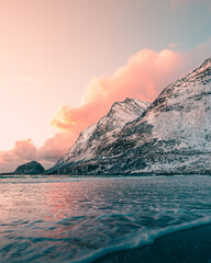 Tranquil Sunset over Snowy Mountains in Lofoten Islands, Norway